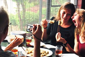 Enjoying Chinese Food in a Local Restaurant