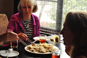 Enjoying Chinese food in a local restaurant