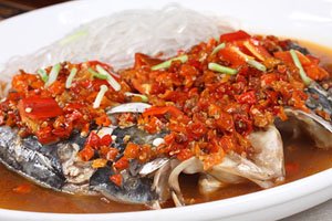 Steamed fish head with diced hot red peppers