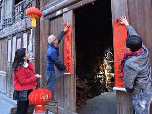 decorate their houses on Chinese New Year's eve